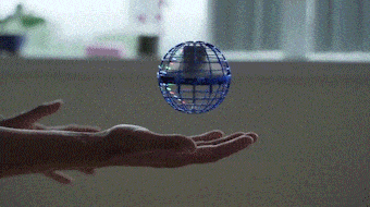 Aurabi Ball glowing and hovering above an open hand