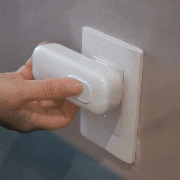 BuzzAway UltraSonic Pest Repeller plugged into a wall outlet